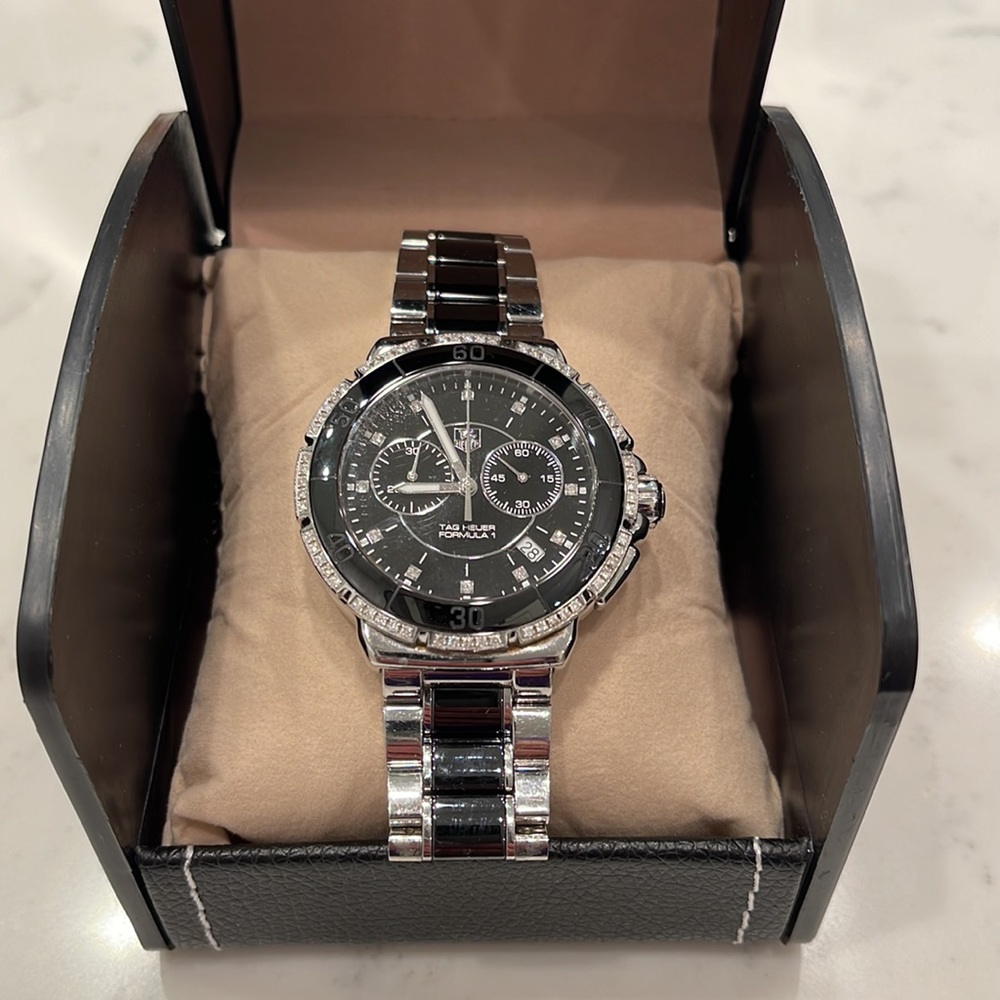 TAG Heuer watch, diamond face with original papers! Black w diamonds.